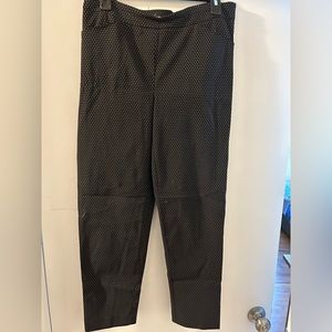 Black pants with white dots